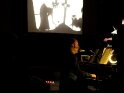Singing shadow storyteller Matthew Robins in action